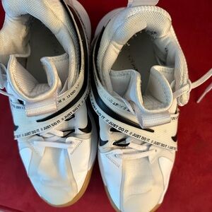 White and black Nike basketball/volleyball shoes- GUC